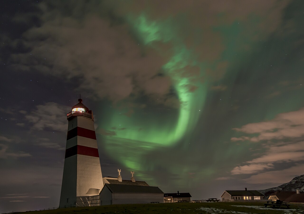 Alnes Lighthouse red tower Godøy island Norway