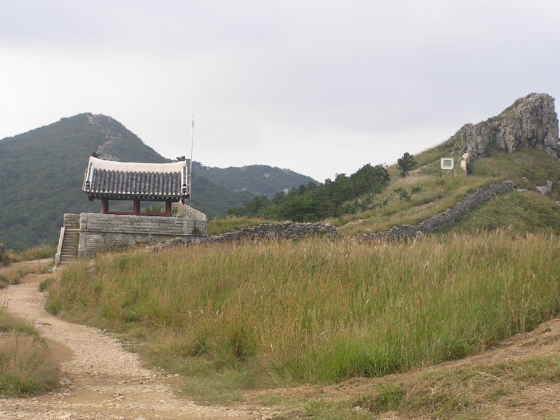 Stone walls of Geumjeongsanseong fortress along the mountain ridgeline in Dongnae-gu