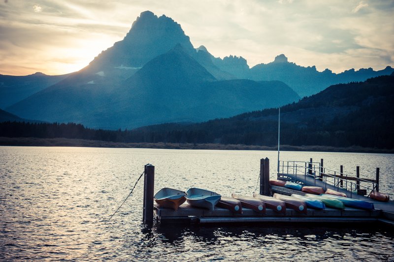 Swiftcurrent Lake with turquoise water and peaks