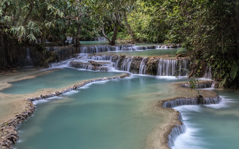 Kuang Si Falls turquoise tiered water pools