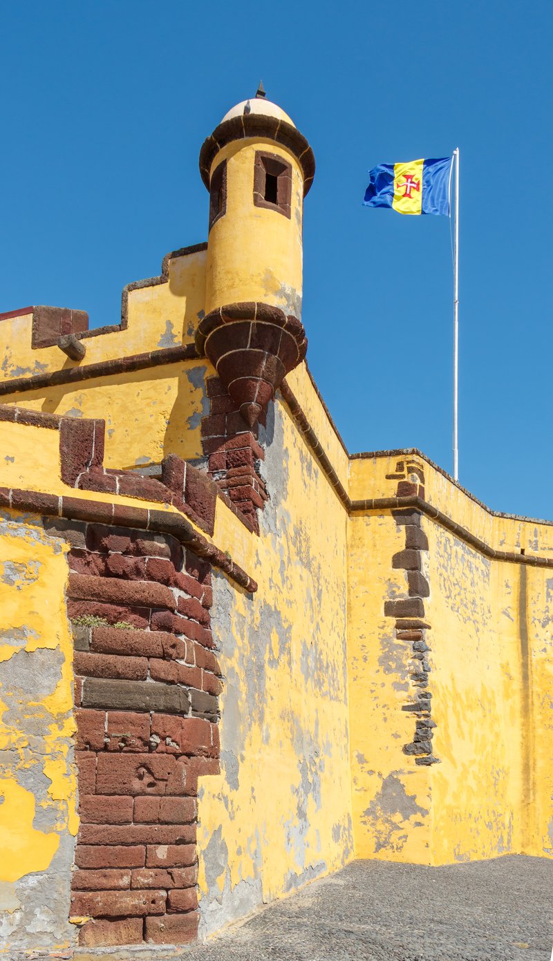 Forte de São Tiago yellow walls and tower Zona Velha
