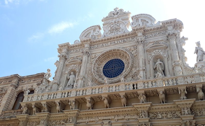 The heavily carved Baroque facade of the Basilica di Santa Croce in Lecce