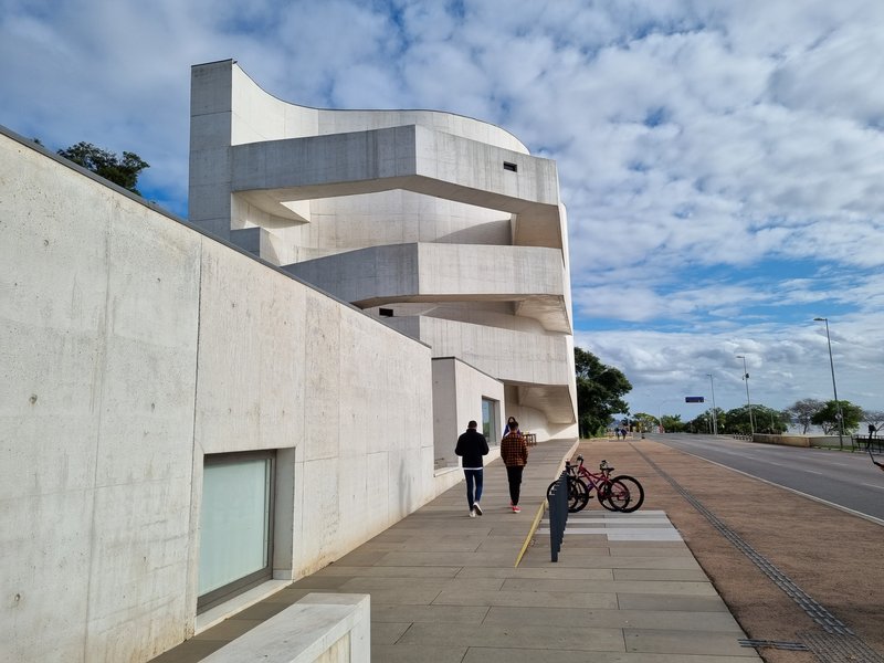 The white concrete mass and external ramps of the Fundação Iberê Camargo in Porto Alegre