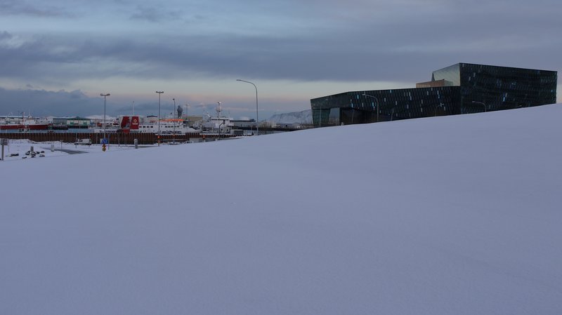 Harpa Concert Hall exterior in snow, Reykjavik harbor