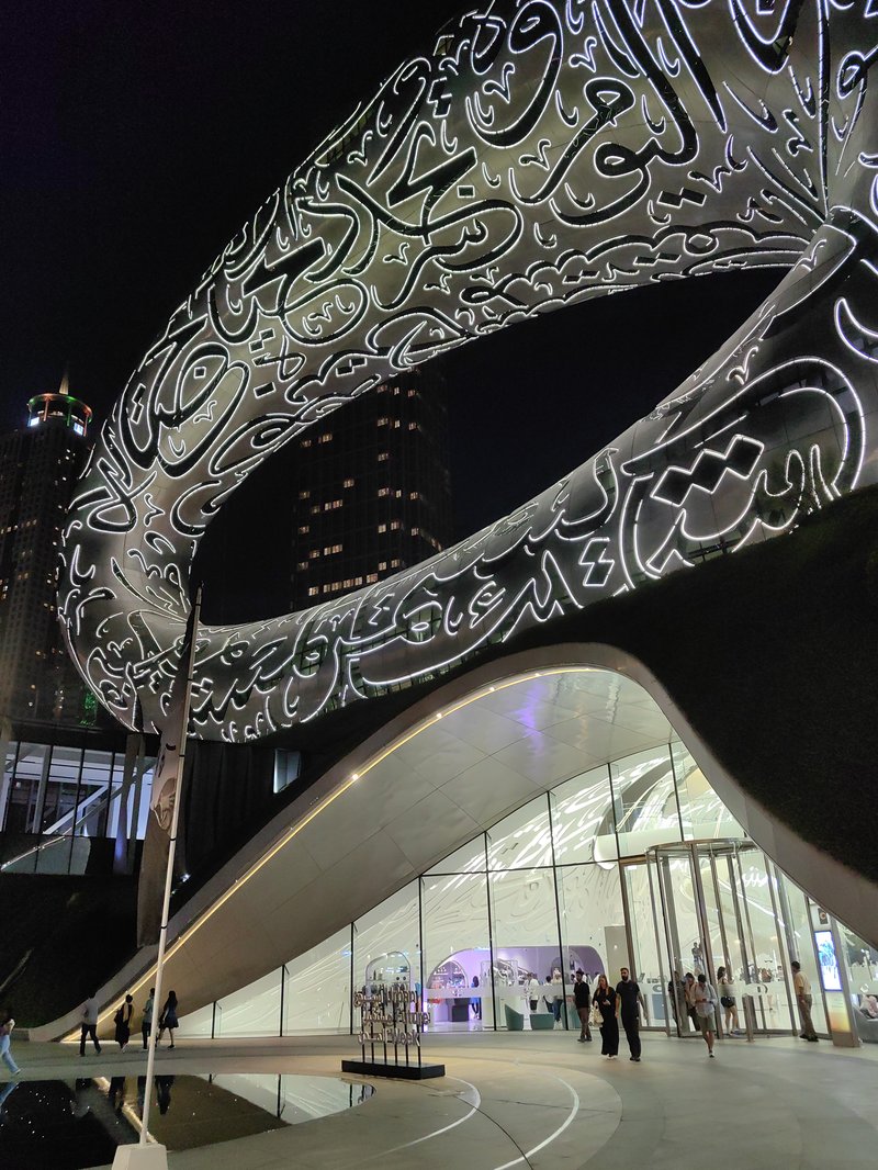 Museum of the Future's illuminated torus-shaped facade at night