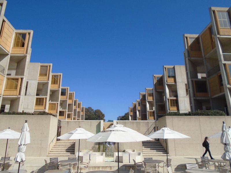 Louis Kahn's travertine plaza between the concrete-and-teak laboratory blocks of the Salk Institute