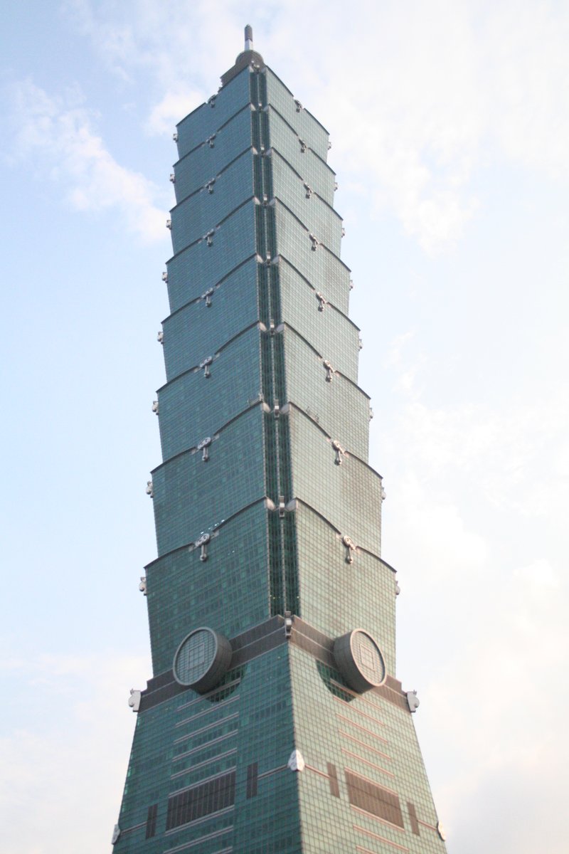 Upward view of Taipei 101's tiered, bamboo-like tapering tower