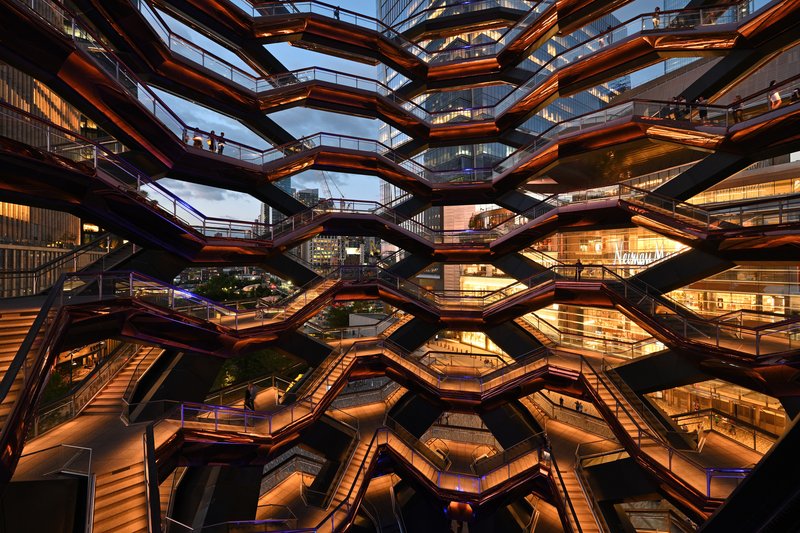 The Vessel's honeycomb of interlocking copper-toned staircases at Hudson Yards, New York City