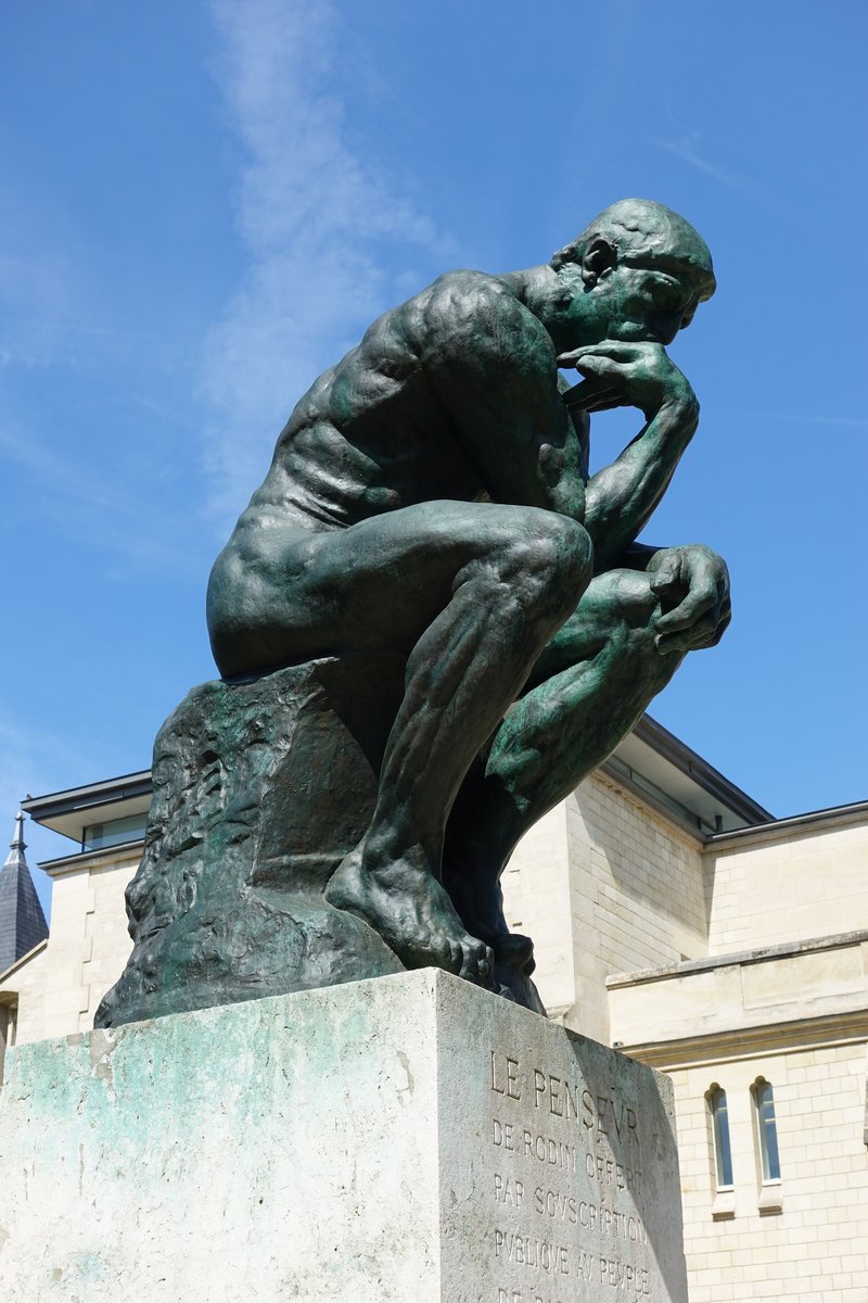 The Thinker sculpture in the garden of Musée Rodin, with the Hôtel Biron behind it, Paris