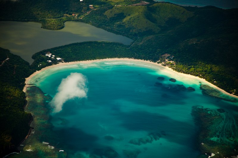 Aerial view of the horseshoe-shaped bay and white sand at Flamenco Beach, Culebra