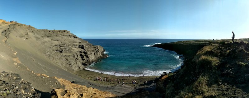 Olive-green sand cove inside the collapsed cinder cone at Papakolea, South Point