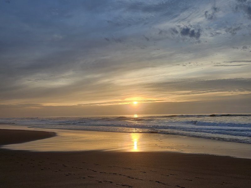 Wind-blown dunes and Atlantic surf at Praia do Guincho near Cascais