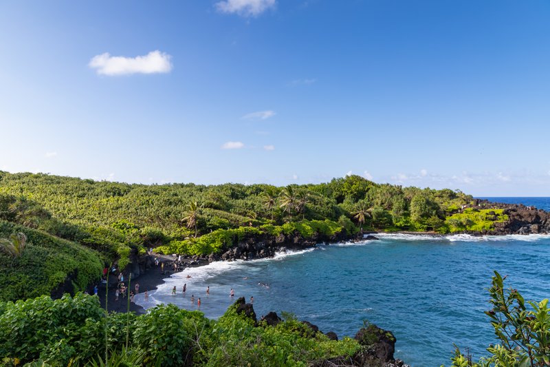 Jet-black volcanic pebble cove at Waianapanapa State Park near Hana