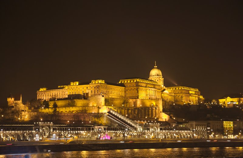 Buda Castle illuminated at night above the Danube, Budapest