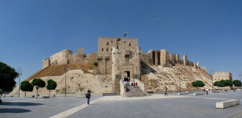 The Citadel of Aleppo atop its fortified mound in the old city