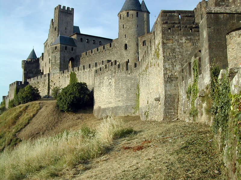 The double walls and turreted towers of the fortified medieval town of Carcassonne
