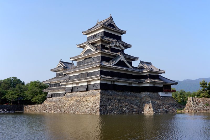 Matsumoto Castle's keep reflected in its moat