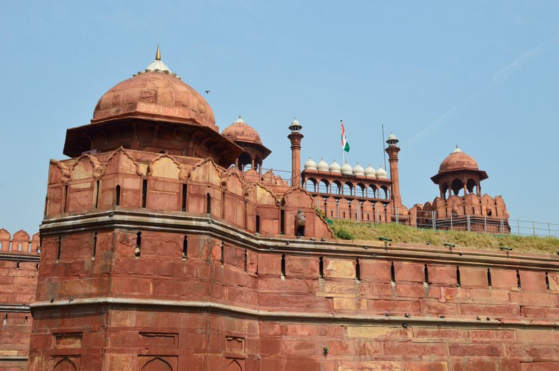 Ramparts and chhatris of the Red Fort with the national flag, Delhi, India