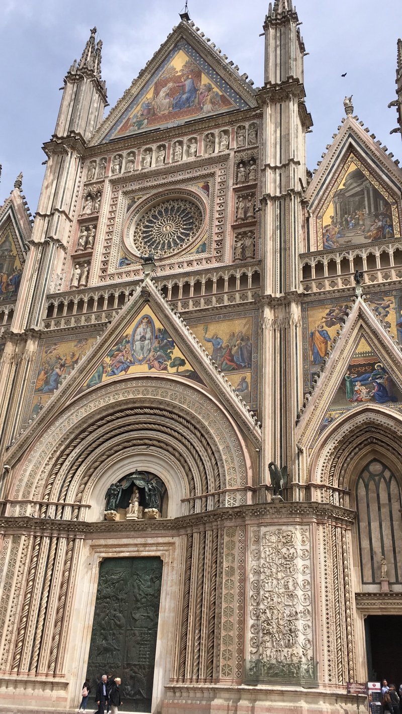 Golden mosaic facade of Orvieto Cathedral