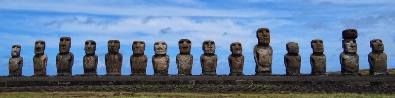 Fifteen restored moai standing in a row at Ahu Tongariki on Easter Island