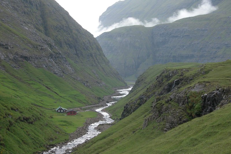 The lagoon and turf-roofed village of Saksun on the Faroe island of Streymoy