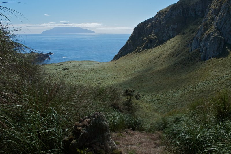 Tristan da Cunha's volcanic cone rising from the South Atlantic, seen from the sea across open water