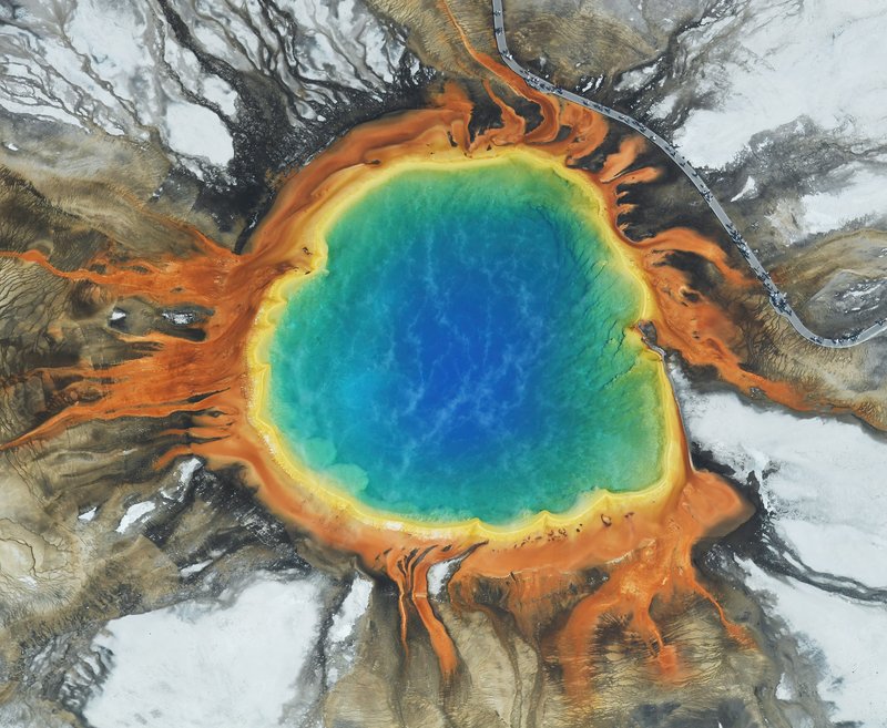 Aerial view of Grand Prismatic Spring's rainbow rings in Yellowstone's Midway Geyser Basin