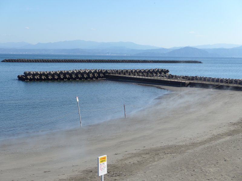 Steam rising from the volcanic sand beach at Ibusuki