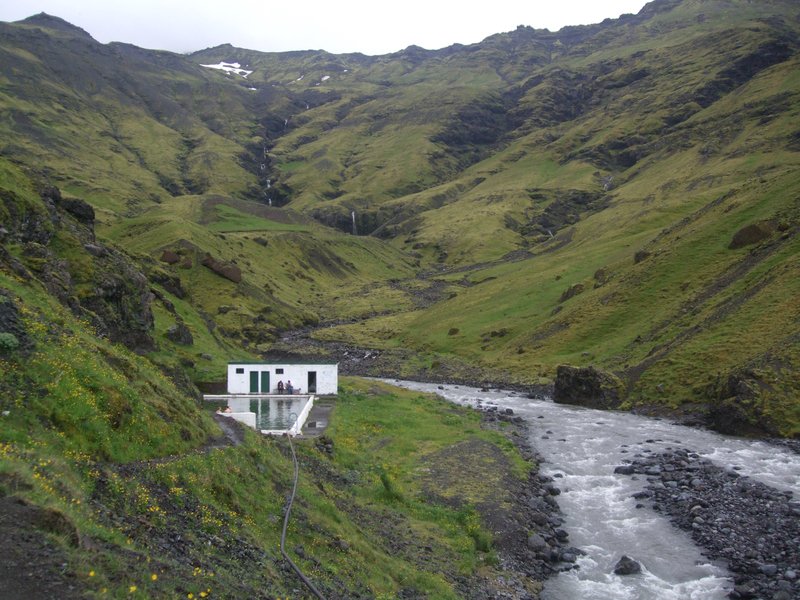 Seljavallalaug geothermal pool set in a hillside valley in South Iceland