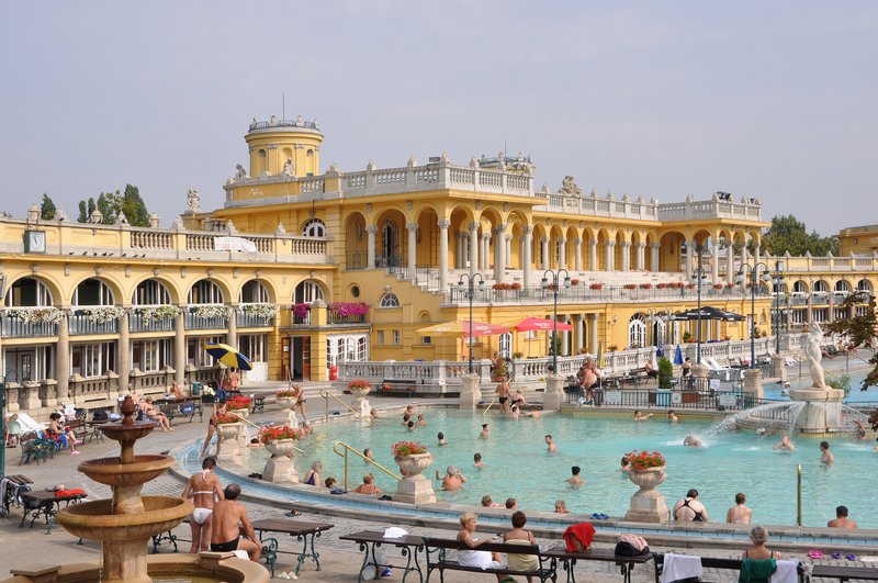 Neo-baroque yellow palace and outdoor thermal pools of Széchenyi Bath in City Park