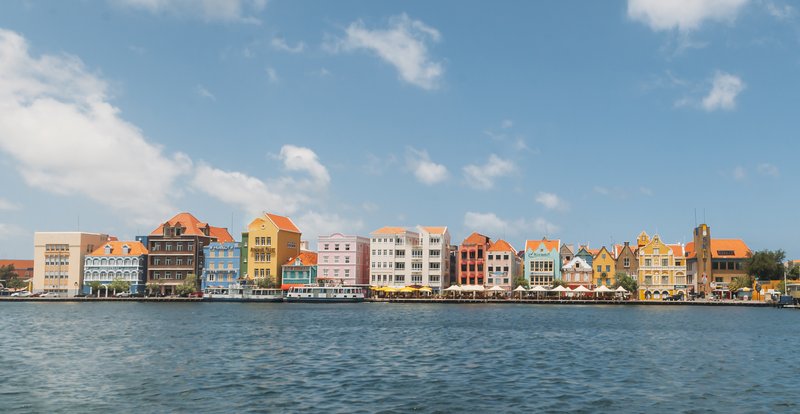 Colorful colonial buildings along the Handelskade waterfront in Willemstad
