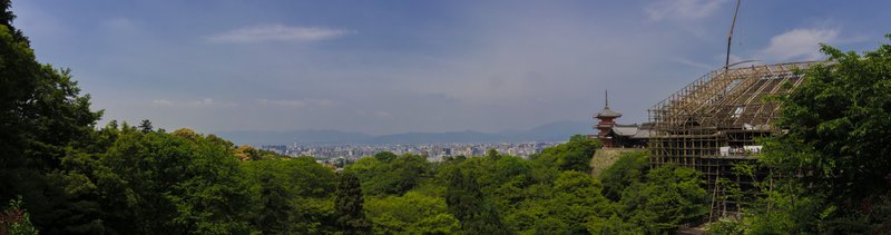 Panoramic view of Kyoto cityscape with Kiyomizu-dera temple and surrounding mountains