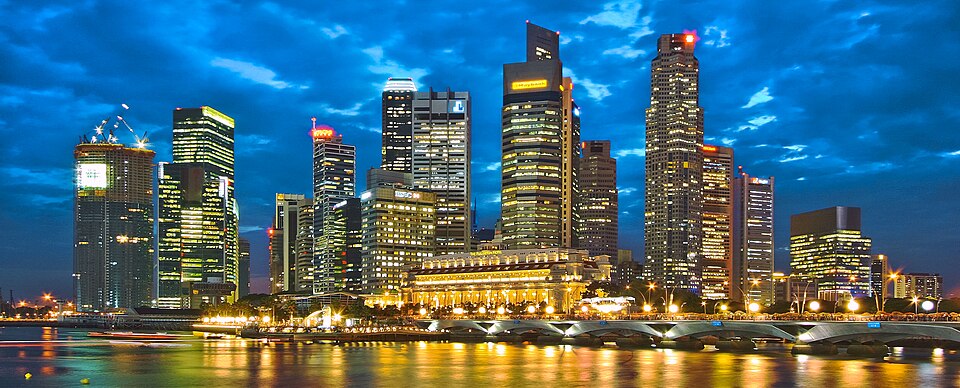 Singapore city skyline at dusk with Marina Bay