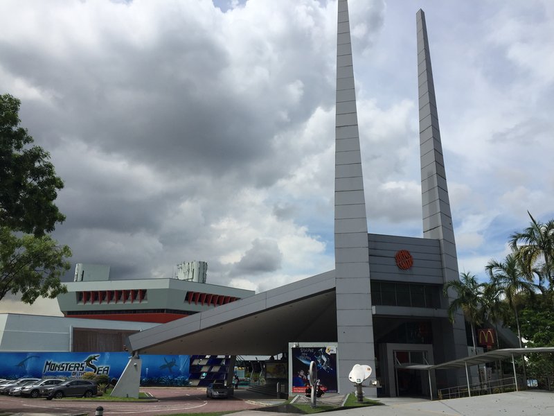 Entrance of Science Centre Singapore with its twin spire towers in Jurong East