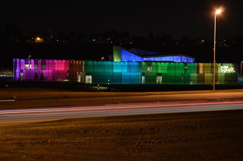 TELUS Spark Science Centre illuminated exterior at night, Calgary