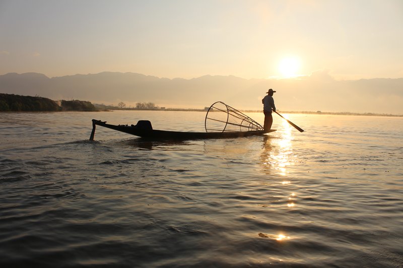 Intha fisherman leg-rowing on Inle Lake, Myanmar