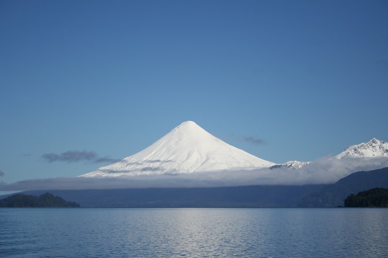 Osorno Volcano rising above emerald Lago Todos los Santos, Chile