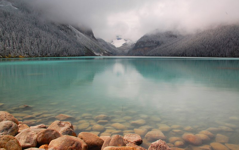Lake Louise's turquoise water framed by glaciers and peaks in Banff National Park