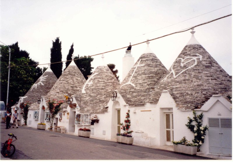 Traditional trulli stone huts with conical roofs, Alberobello, Puglia, Italy