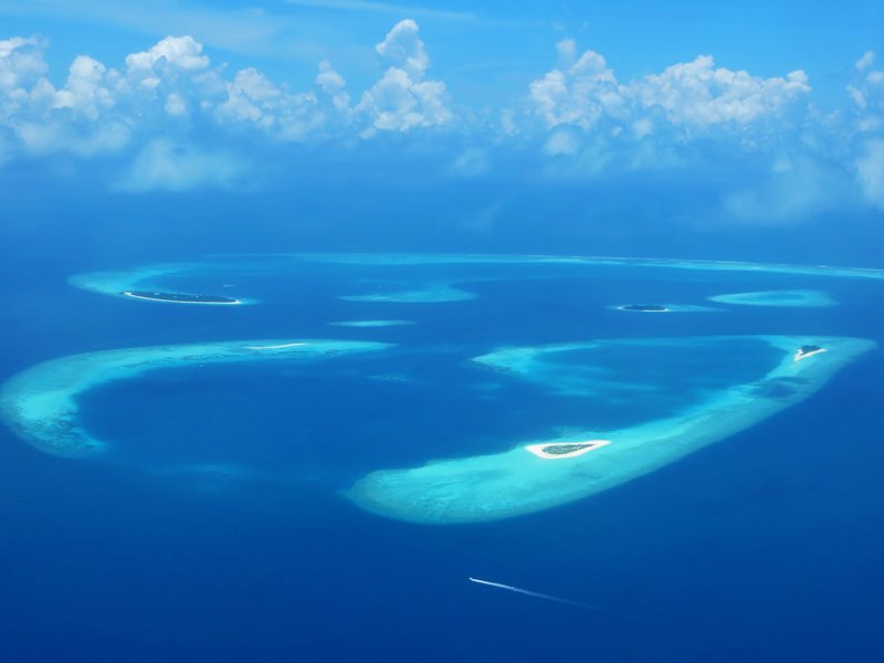 Aerial view of coral islands in a Maldives atoll