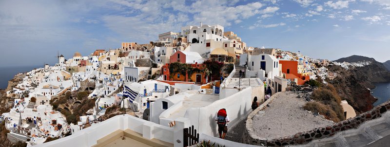Panoramic view of Oia village and the Santorini caldera, Greece