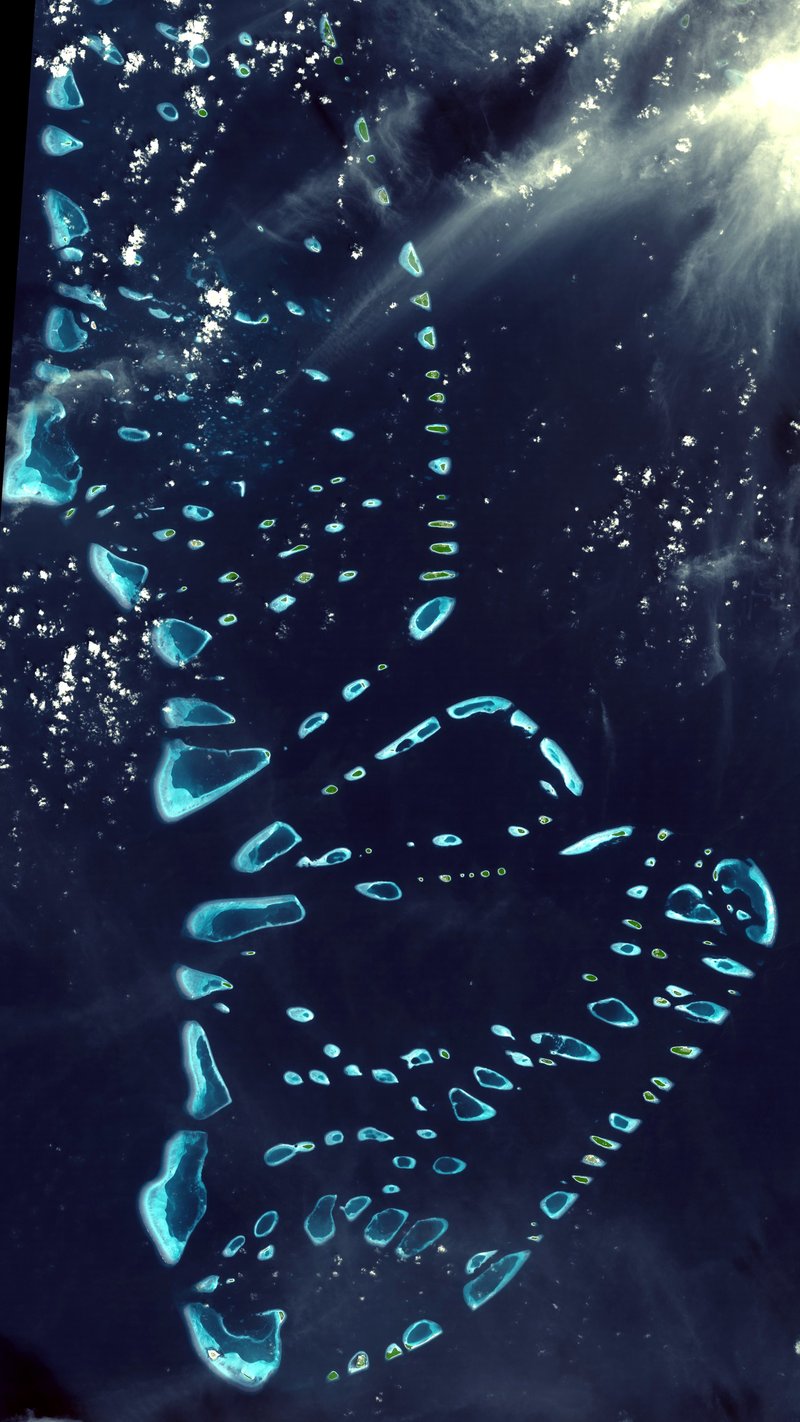 Aerial view of Raa Atoll and its turquoise lagoon, Maldives