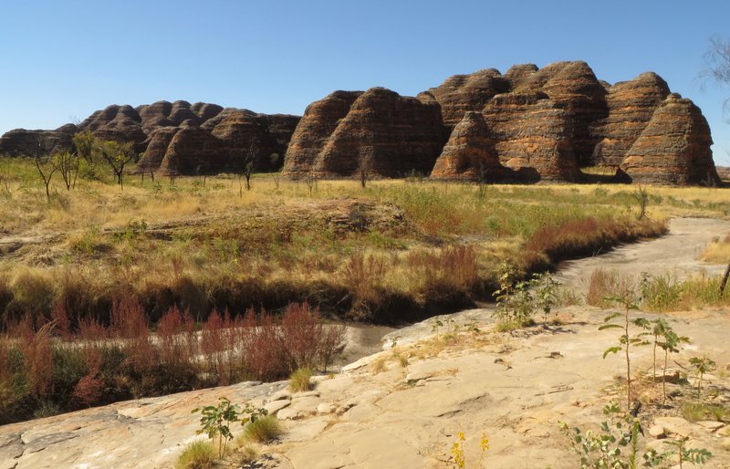 Orange-and-black striped sandstone beehive domes of the Bungle Bungle Range