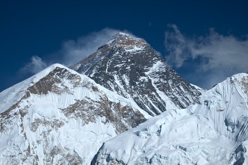 Summit pyramid of Mount Everest above the Himalayas