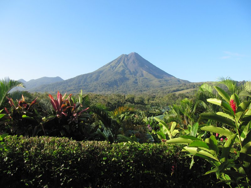 Arenal Volcano cone rising above rainforest, Costa Rica