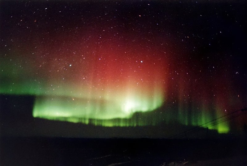 Red and green aurora borealis over Fairbanks, Alaska