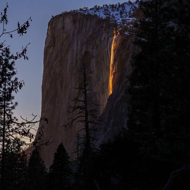 Horsetail Fall glowing orange-red at sunset on El Capitan