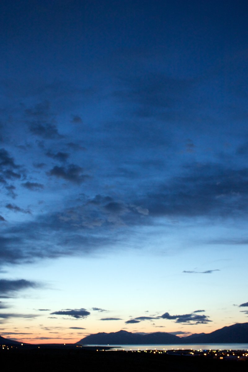 Midnight sun glow over the fjord at Akureyri, North Iceland
