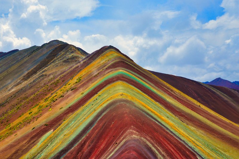 Striped mineral slopes of Vinicunca, Rainbow Mountain, in the Peruvian Andes