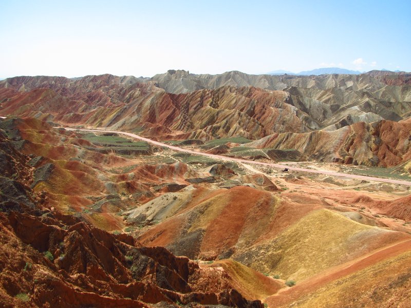 Striped red, orange, and yellow sandstone ridges of the Zhangye Danxia landform
